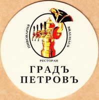Град